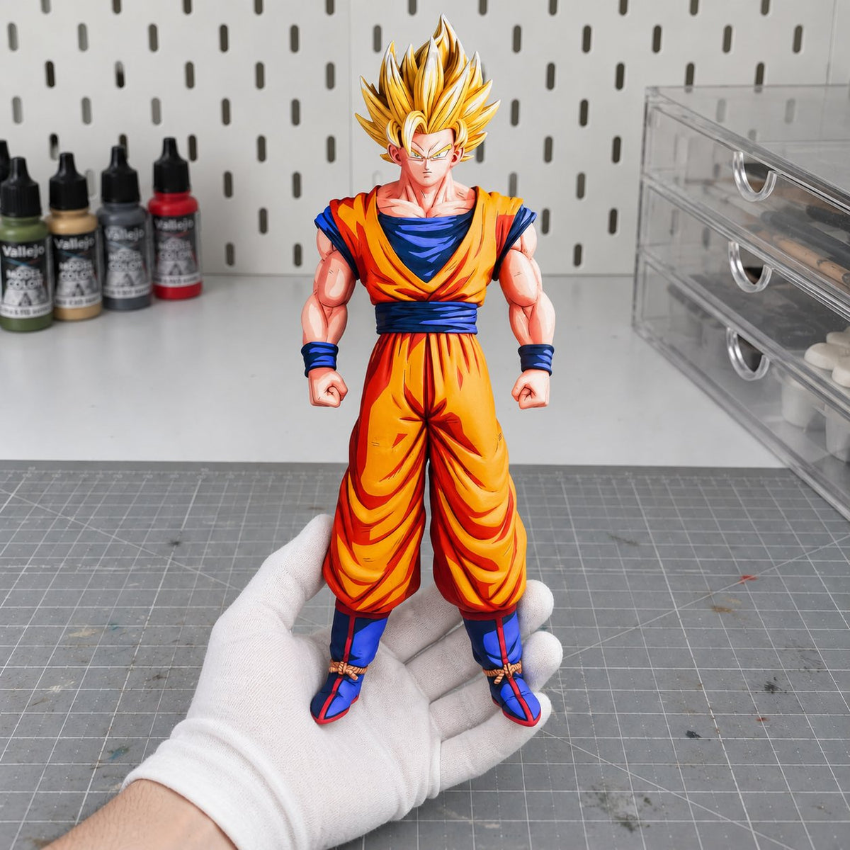 Dragon Ball Super Saiyan 2 Son Goku Figure Repaint — 31 cm Standing Pose — painted figure in a miniature painting workshop