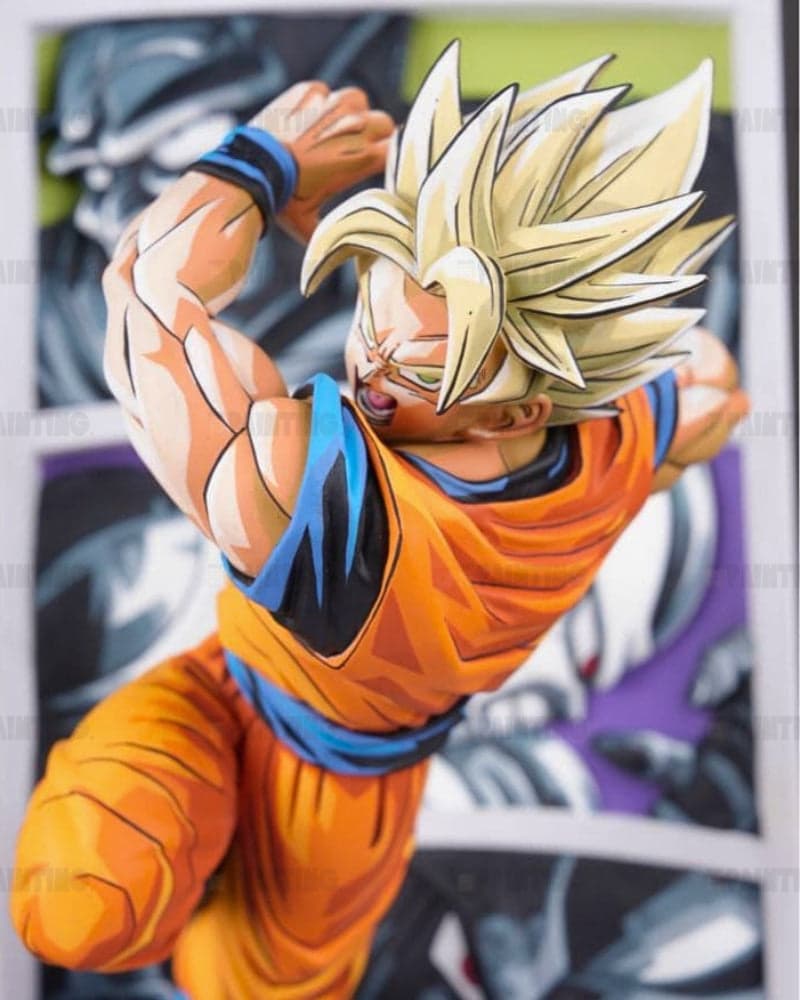 A collectible anime figurine of Goku in a dynamic pose, wearing his signature orange and blue gi, with spiky blond hair, set against a blurred comic book background.