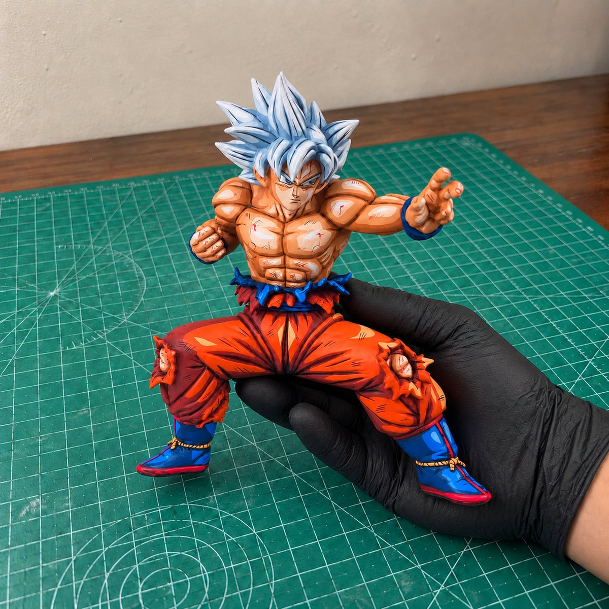 Anime Colour Dragon Ball Super Son Goku Ultra Instinct Figure Repaint — held in hand