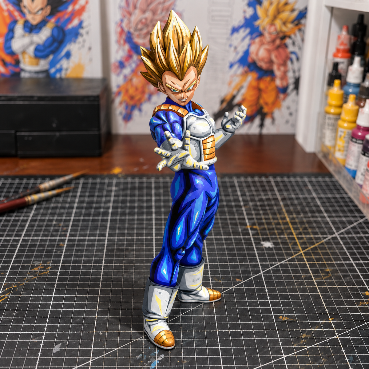 Hand-painted Vegeta Open Hand figure — workshop setting