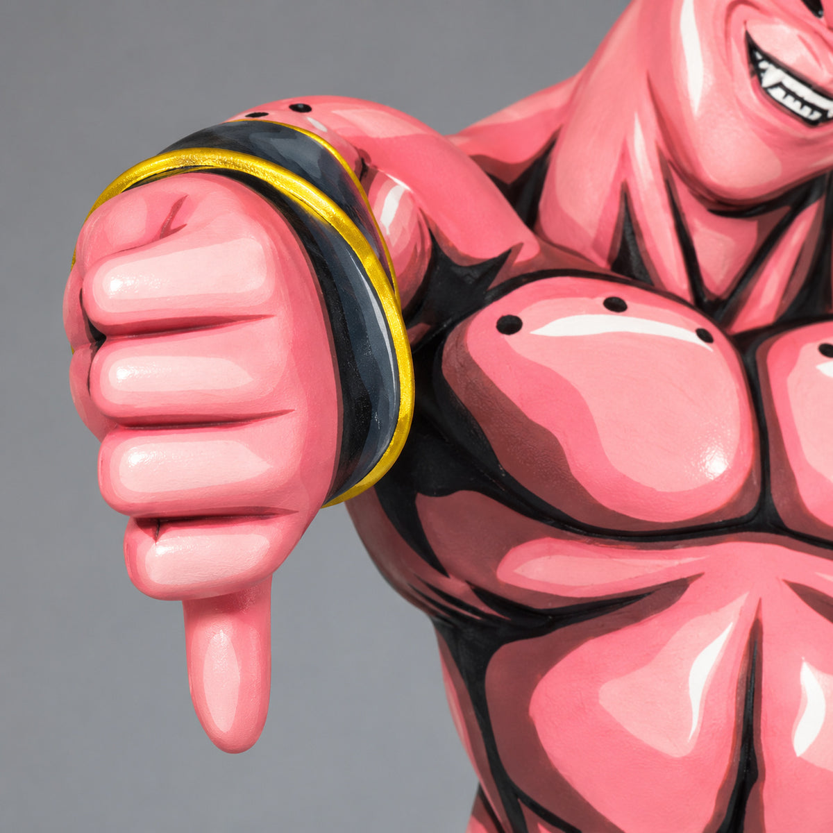 Dragon Ball Z Majin Super Buu Evil Figure Repaint — extended thumb-down fist and black gold cuff