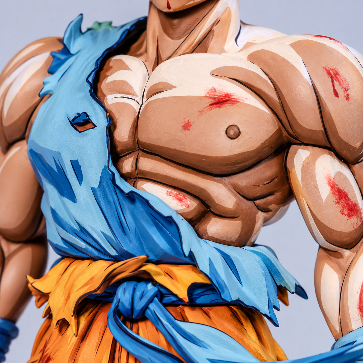 Dragon Ball 2D Anime Colour Namek Goku Figure Repaint — bare chest and torn blue fabric paintwork