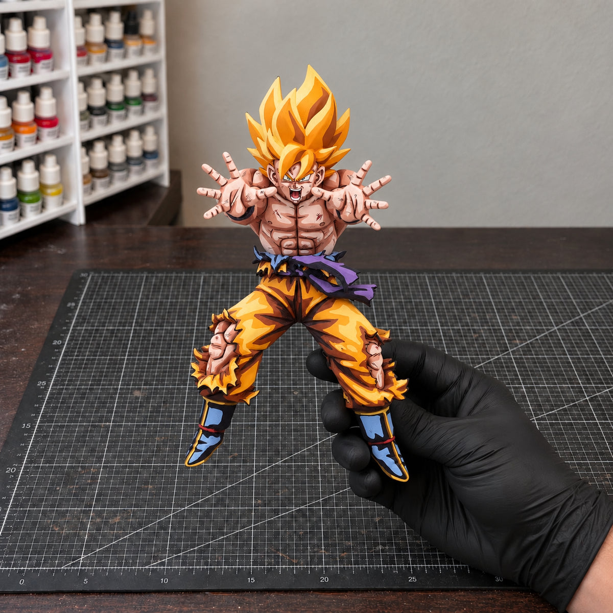 Dragon Ball Super Saiyan Son Goku 2D Figure Repaint — held in hand