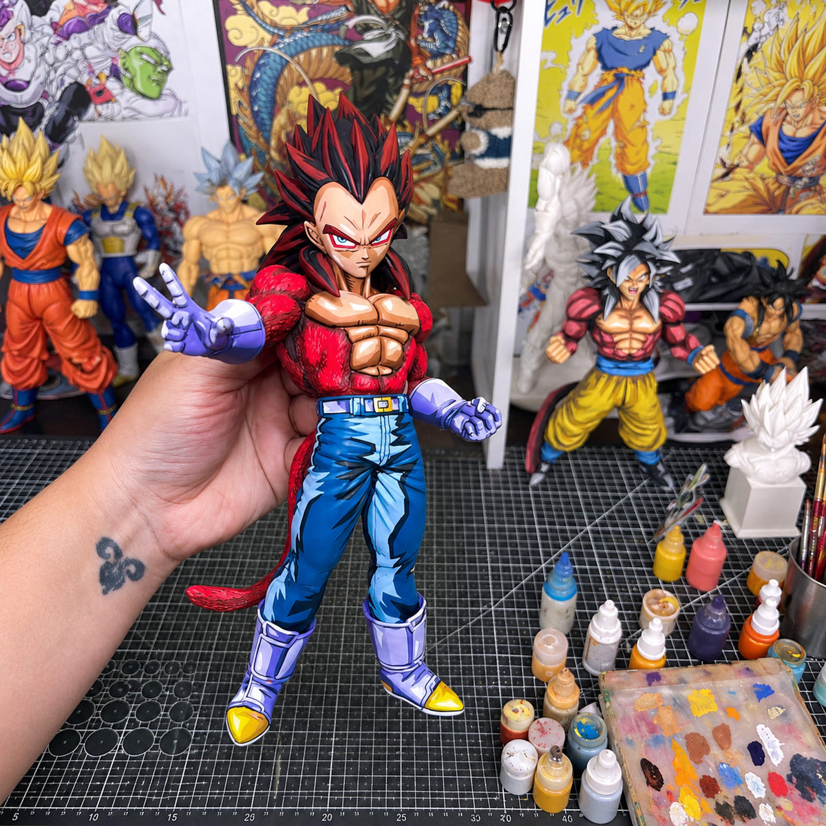 Super Saiyan 4 Vegeta 2D painted collectible, figure held in hand
