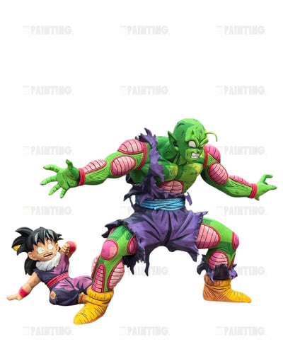 A collectible figurine of Piccolo and Goku in a dynamic battle pose, featuring green skin, torn purple and pink clothing, and yellow boots, set against a plain white background.