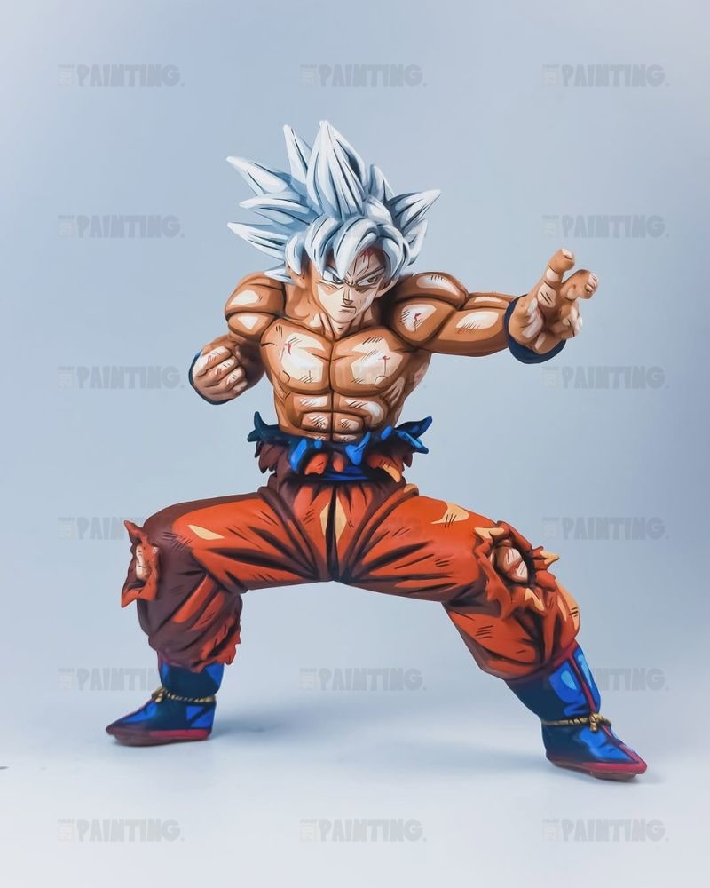 A detailed collectible figurine of Goku in a Super Saiyan pose, featuring spiky silver hair, a muscular torso, orange gi pants, and blue boots, set against a clean light gray background.