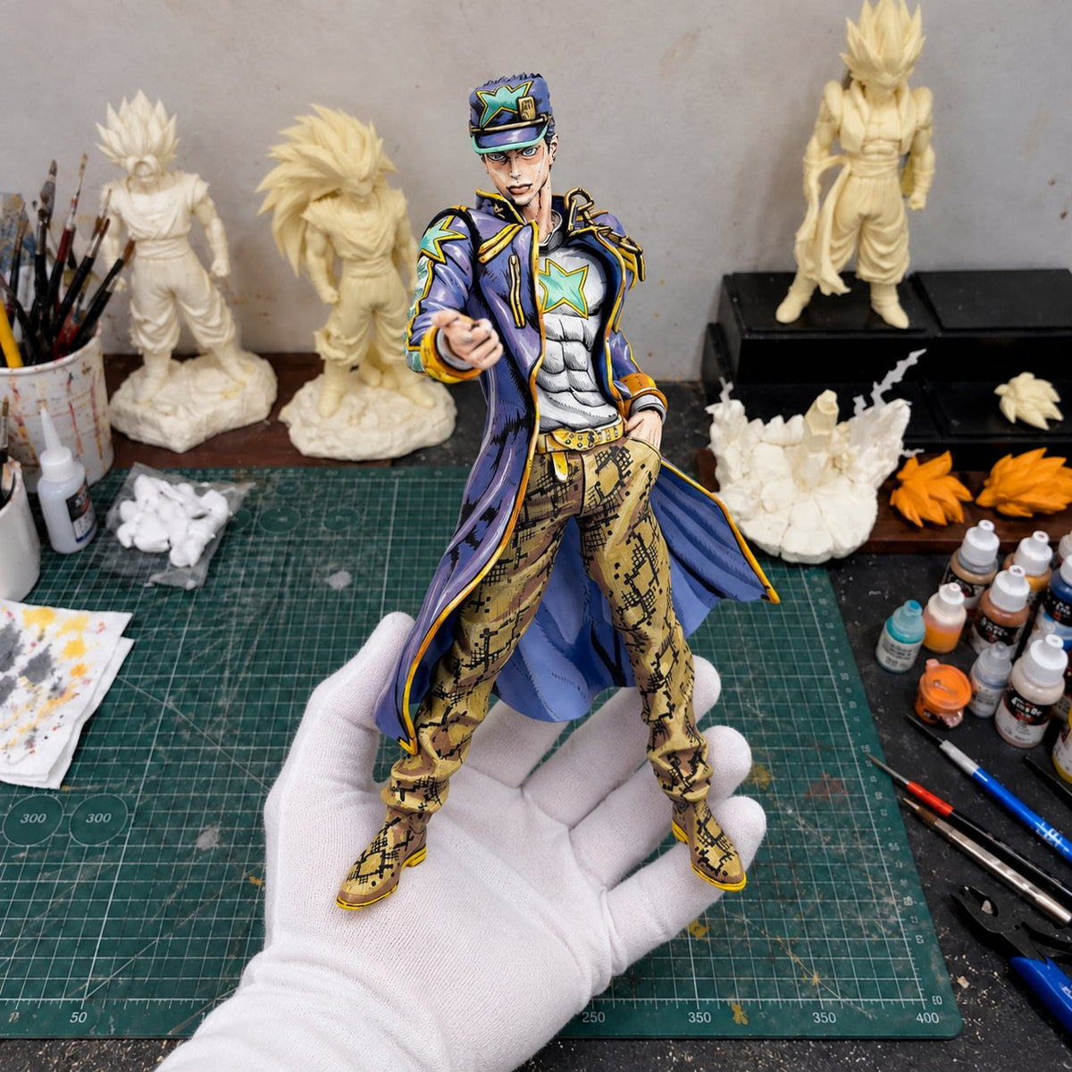 Jotaro Kujo 2D Painted Figure – Pointing Pose — workshop view