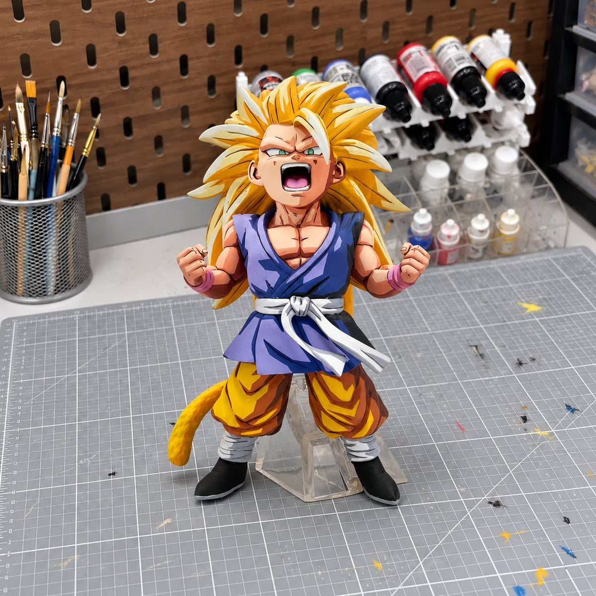 Dragon Ball Super Saiyan 3 Son Goku Kid Figure Repaint — workshop view