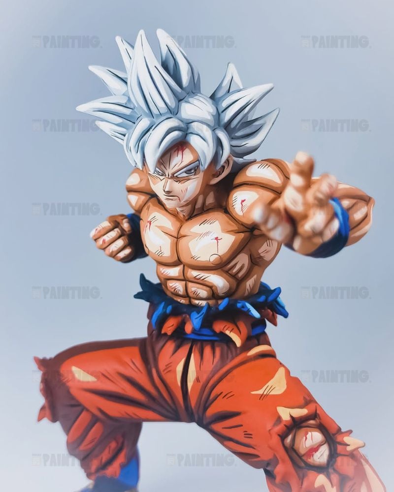 An anime-style illustration of a muscular male character with spiky silver hair, wearing torn orange pants and a blue waist sash, posed against a soft light blue gradient background.