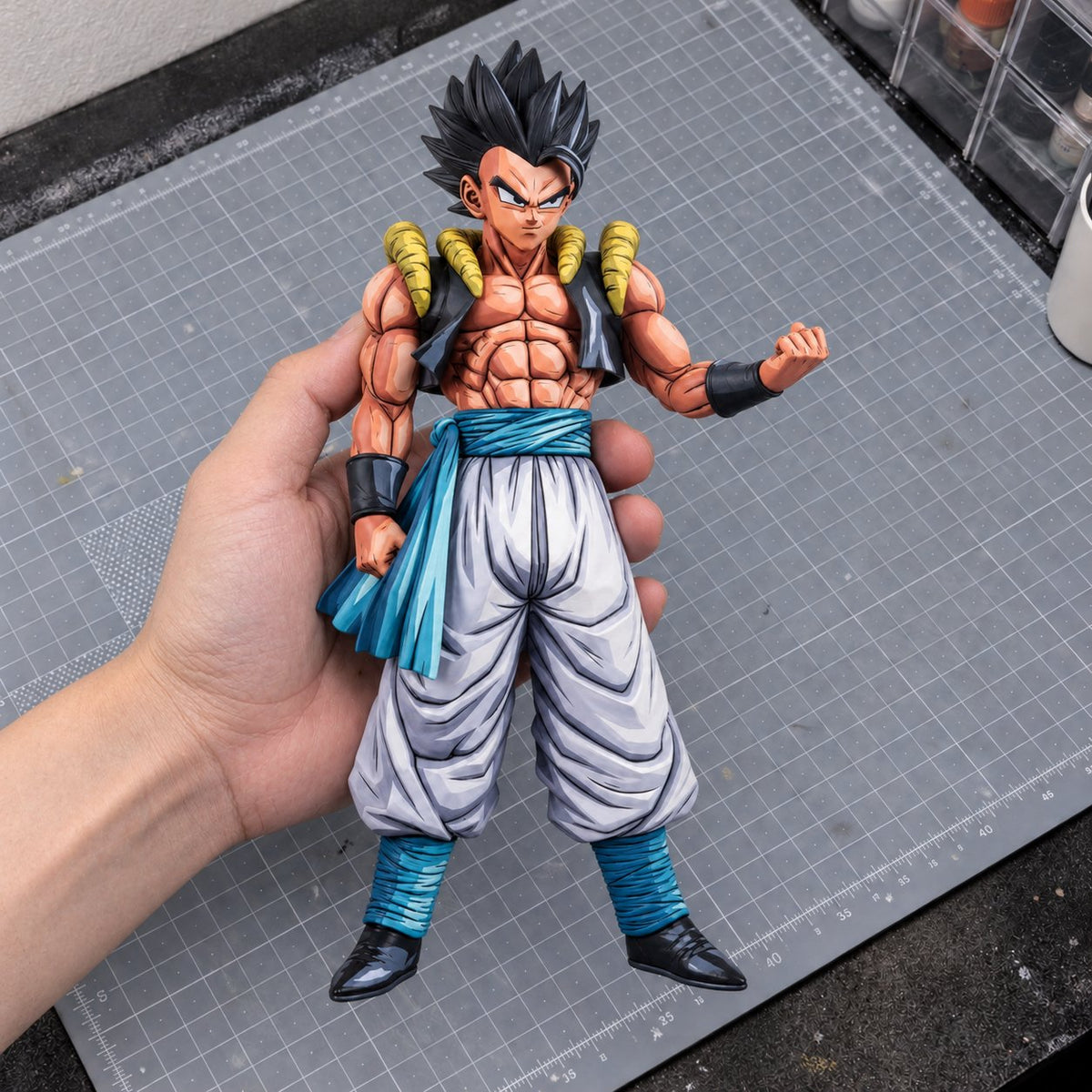 Hand-Painted Dragon Ball Gogeta Base Form Figure Repaint — workshop view