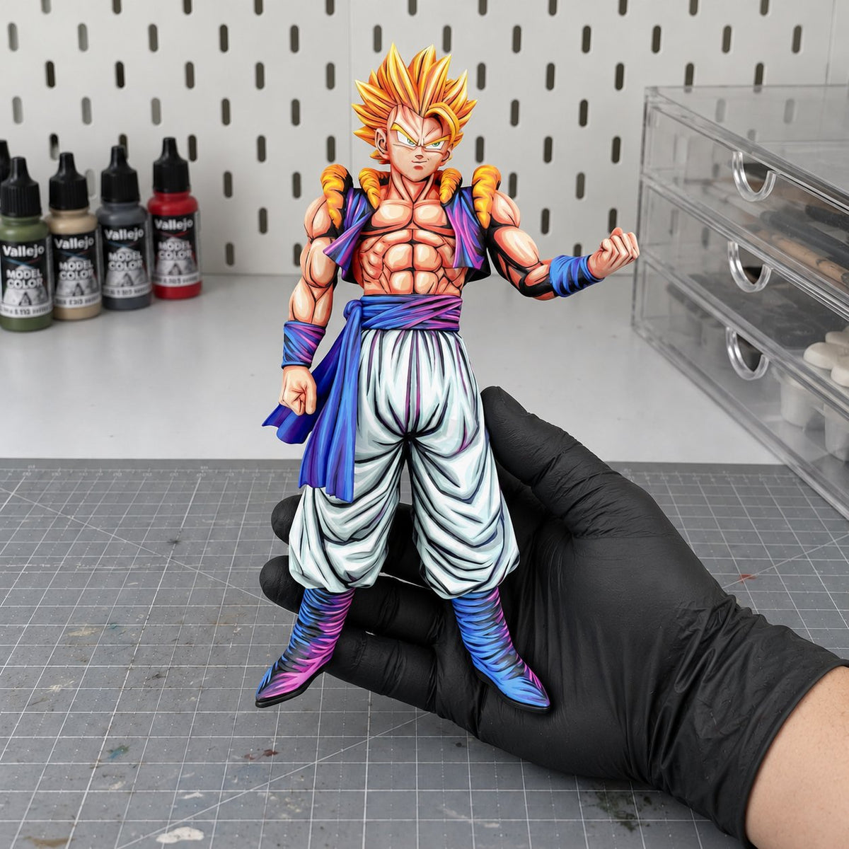 Dragon Ball Super Saiyan Gogeta Anime Colour Figure Repaint — painted figure in a miniature painting workshop