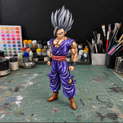 Hand-painted Gohan Beast figure — workshop setting