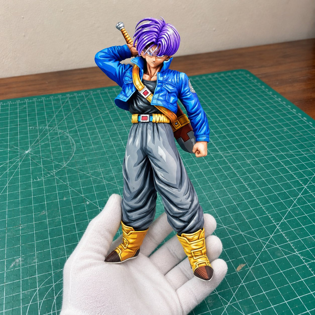Comic Colour Dragon Ball Legends Trunks Figure Repaint — painted figure in a miniature painting workshop