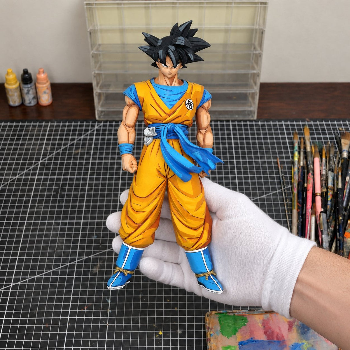 Dragon Ball Son Goku 2D Comic Colour Figure Repaint — figure in painting workshop