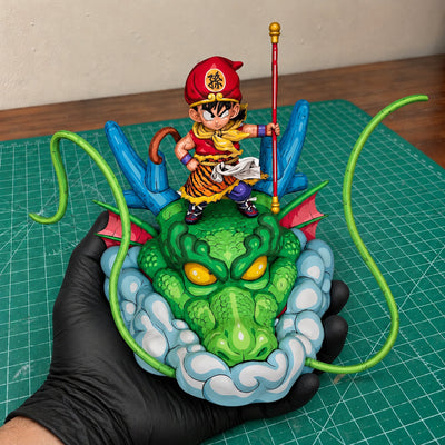 Hand-Painted Dragon Ball Kid Goku on Shenron Figure Repaint — figure in painting workshop