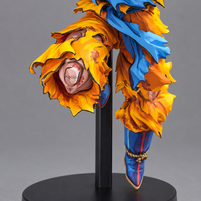 Super Saiyan Son Goku Jump 50th Anniversary Figure Repaint — raised knee, torn orange trousers and boot