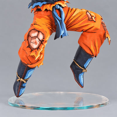 Dragon Ball Super SSJ Son Goku Figure Repaint — orange trouser knees, blue boots and transparent oval display stand
