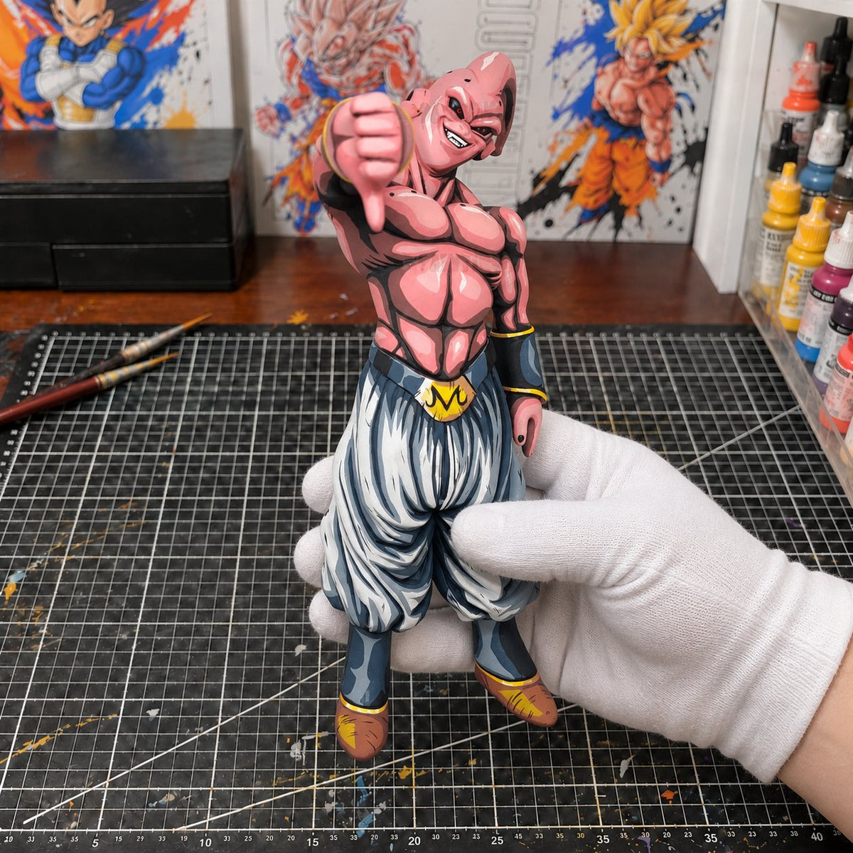 Dragon Ball Z Majin Super Buu Evil Figure Repaint — painted figure in a miniature painting workshop