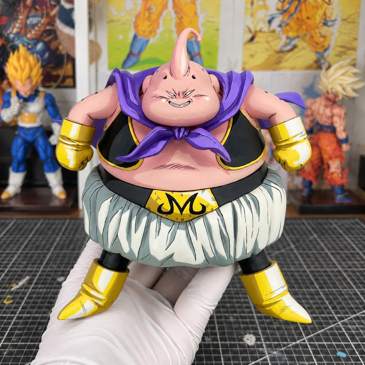 Anime Colour Dragon Ball Fat Buu Figure Repaint — painted figure in a miniature painting workshop