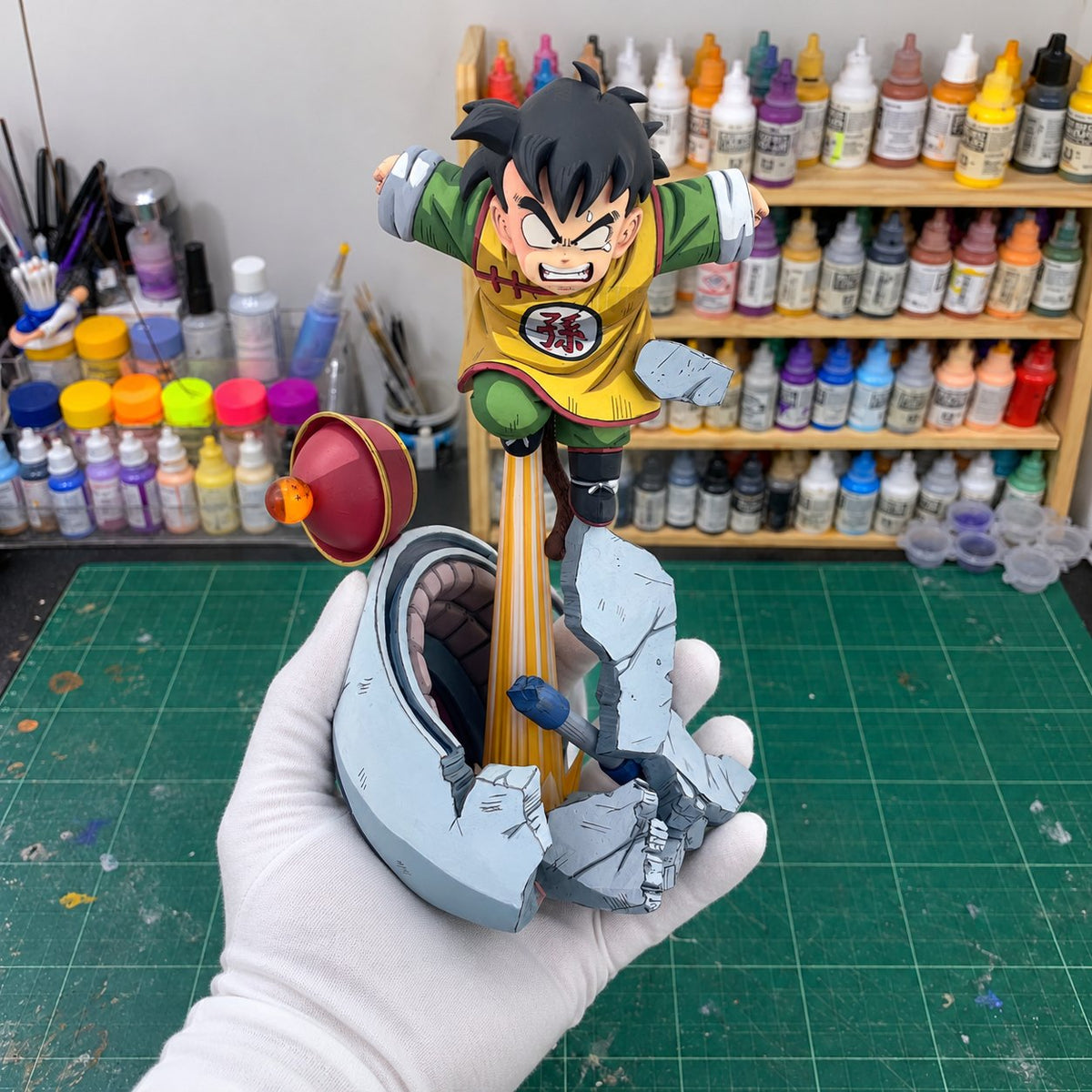 Dragon Ball Son Gohan Masterlise Plus Figure Repaint — painted figure in a miniature painting workshop