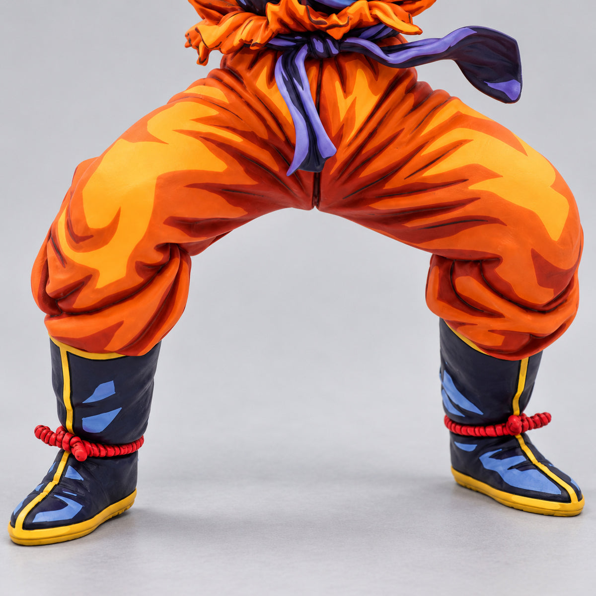 Manga Colour Super Saiyan Son Goku Figure Repaint — orange lower trousers and complete black yellow boots