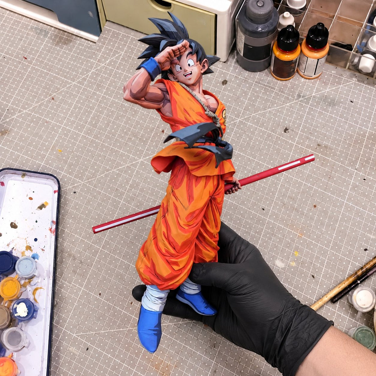 Dragon Ball Z Goodbye Son Goku Figure Repaint — painted figure in a miniature painting workshop