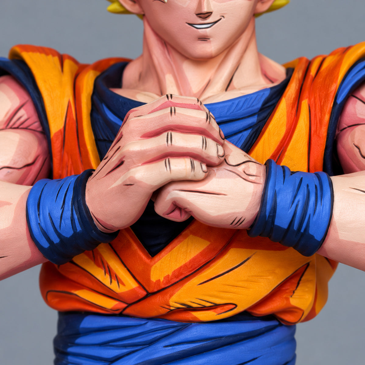 Dragon Ball Super Saiyan Son Goku Figure Repaint — Front-Facing Pose — interlocked fingers and blue wristbands