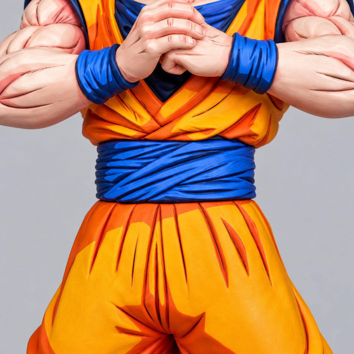 Dragon Ball Super Saiyan Son Goku Figure Repaint — Front-Facing Pose — Waist sash beneath clasped hands