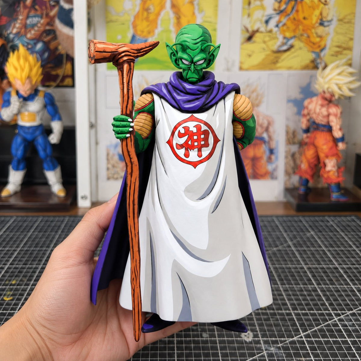 Custom Painted Dragon Ball Z God Piccolo Figure Repaint — workshop view