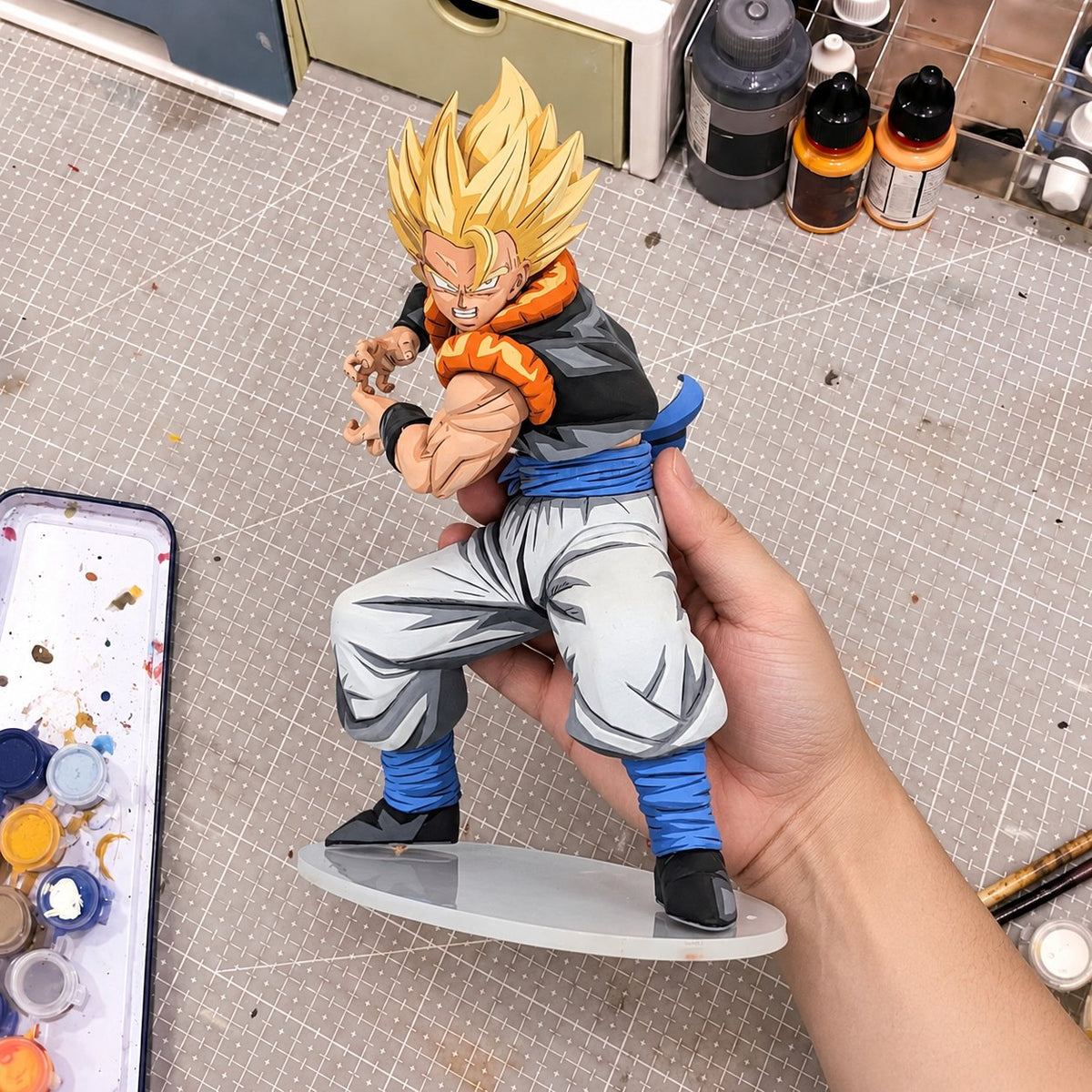 Dragon Ball Grandista Gogeta Anime Figure Repaint — painted figure in a miniature painting workshop