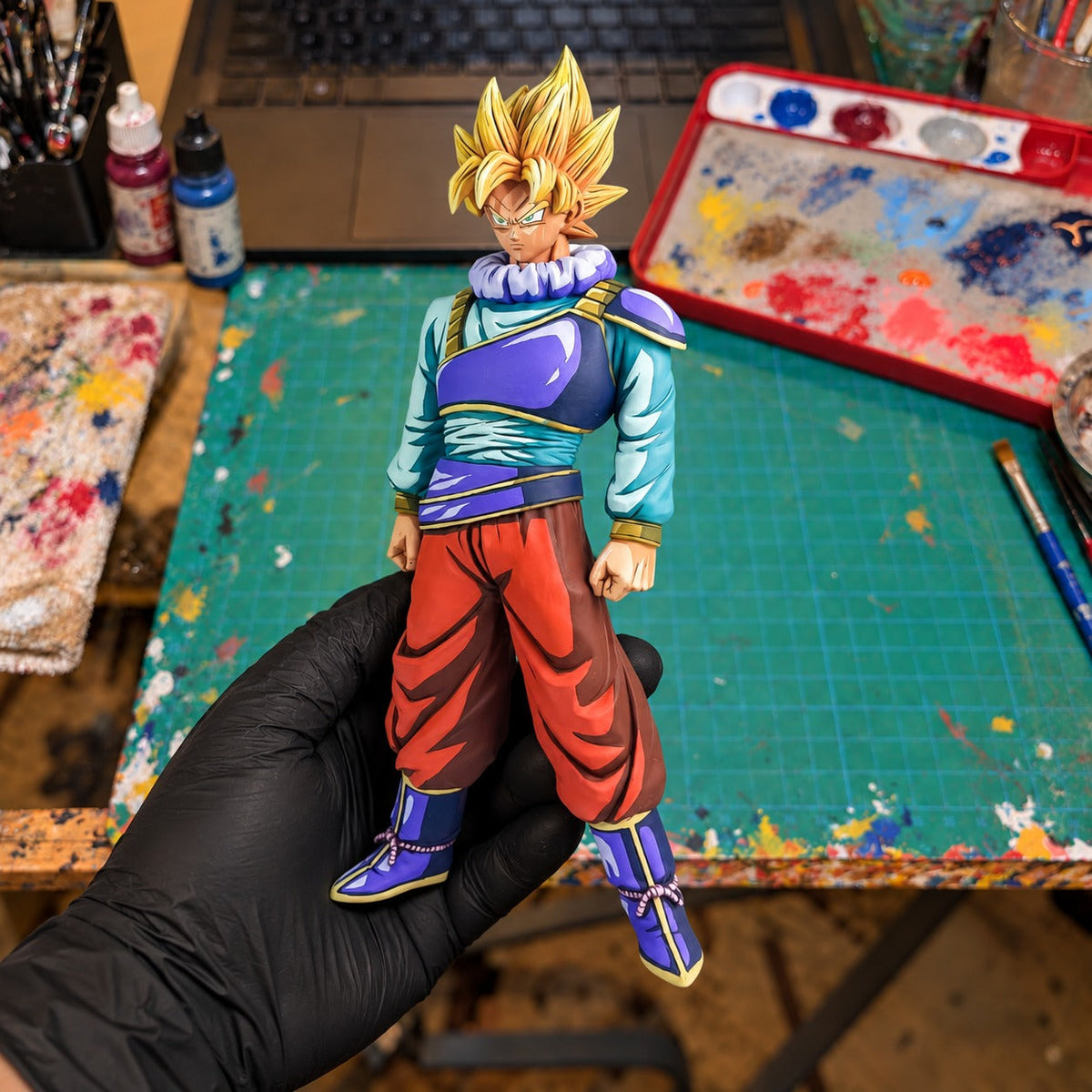 Dragon Ball Son Goku Yardrat 2D Colour Figure Repaint — painted figure in a miniature painting workshop