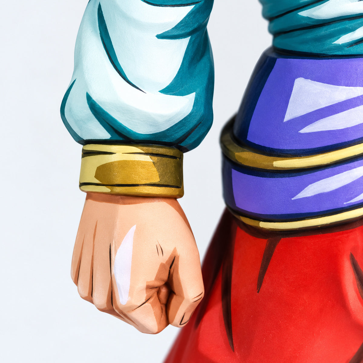 Dragon Ball Son Goku Yardrat 2D Colour Figure Repaint — clenched fist and teal sleeve cuff