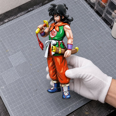 Dragon Ball Yamcha Figure Repaint — painted figure in a miniature painting workshop