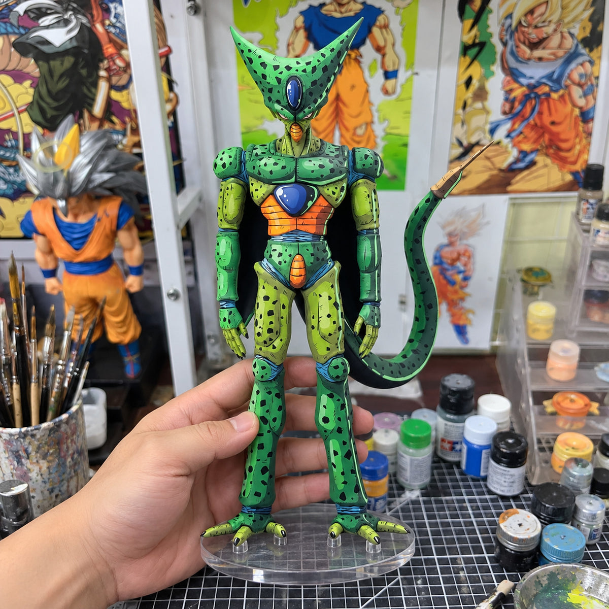 Anime Colour Dragon Ball Z Cell First Form Figure Repaint — painted figure in a miniature painting workshop