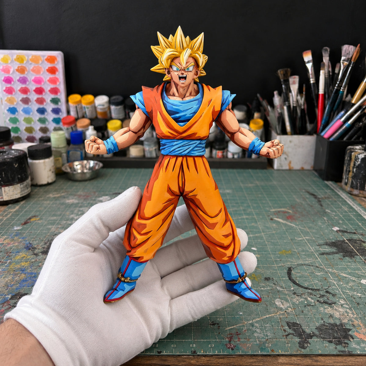 Comic Colour Dragon Ball Super Saiyan Goku Figure Repaint — workshop view