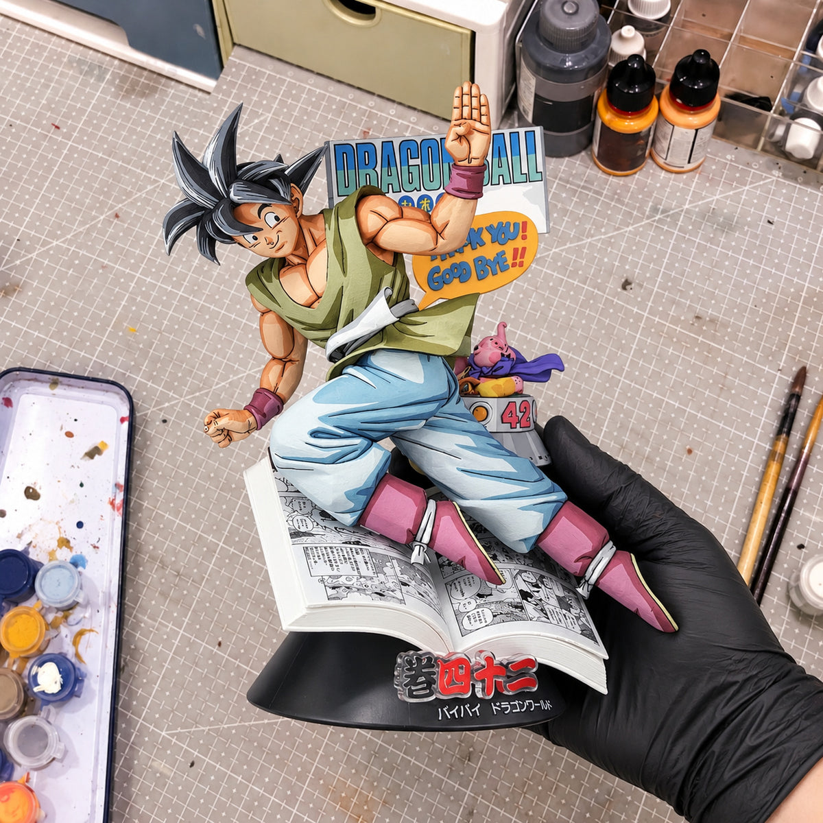 Custom Dragon Ball 40th Comics Vignette Goku Figure Repaint — workshop view