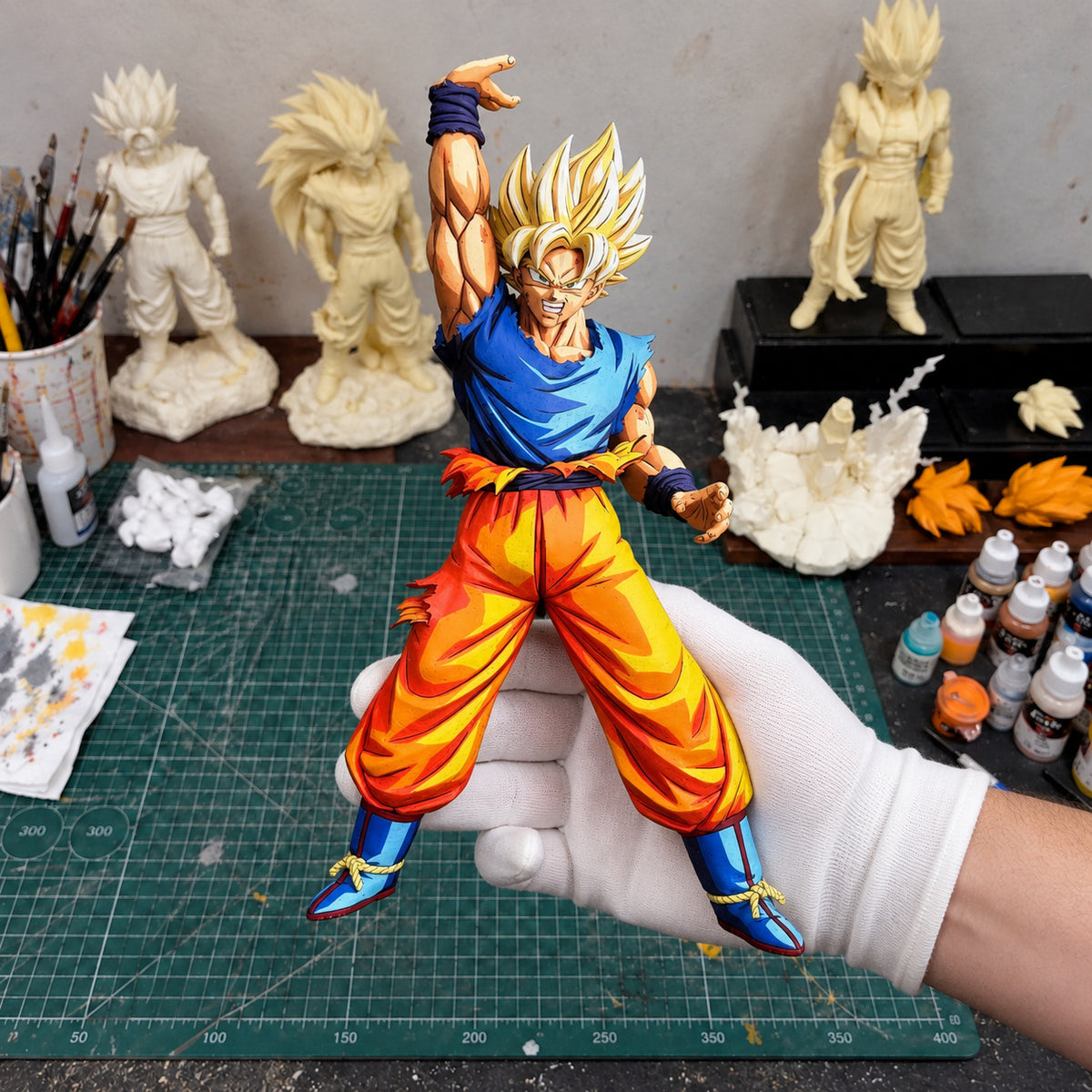 Spirit Bomb Dragon Ball Super Saiyan Goku Figure Repaint — workshop view