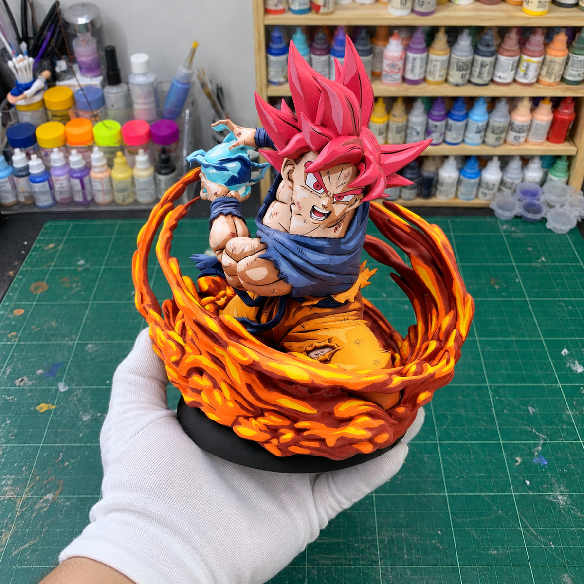Anime 2D Painted Super Saiyan God Son Goku Figure — workshop view