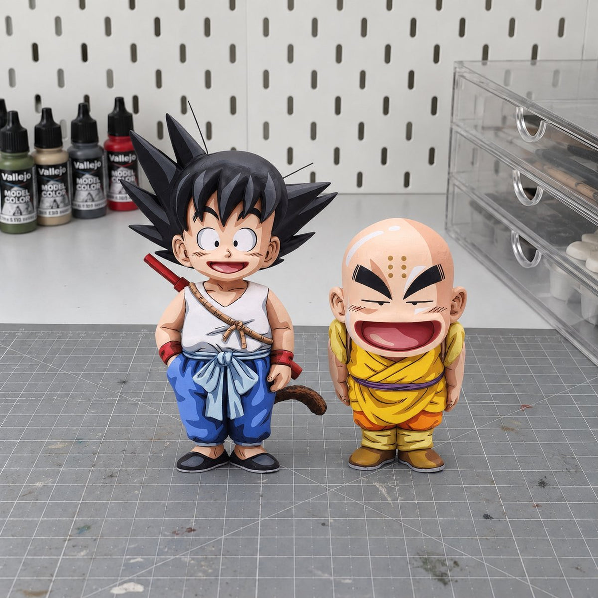 Anime Style Dragon Ball Z Kid Son Goku & Krillin Figure Repaint — hand or studio view