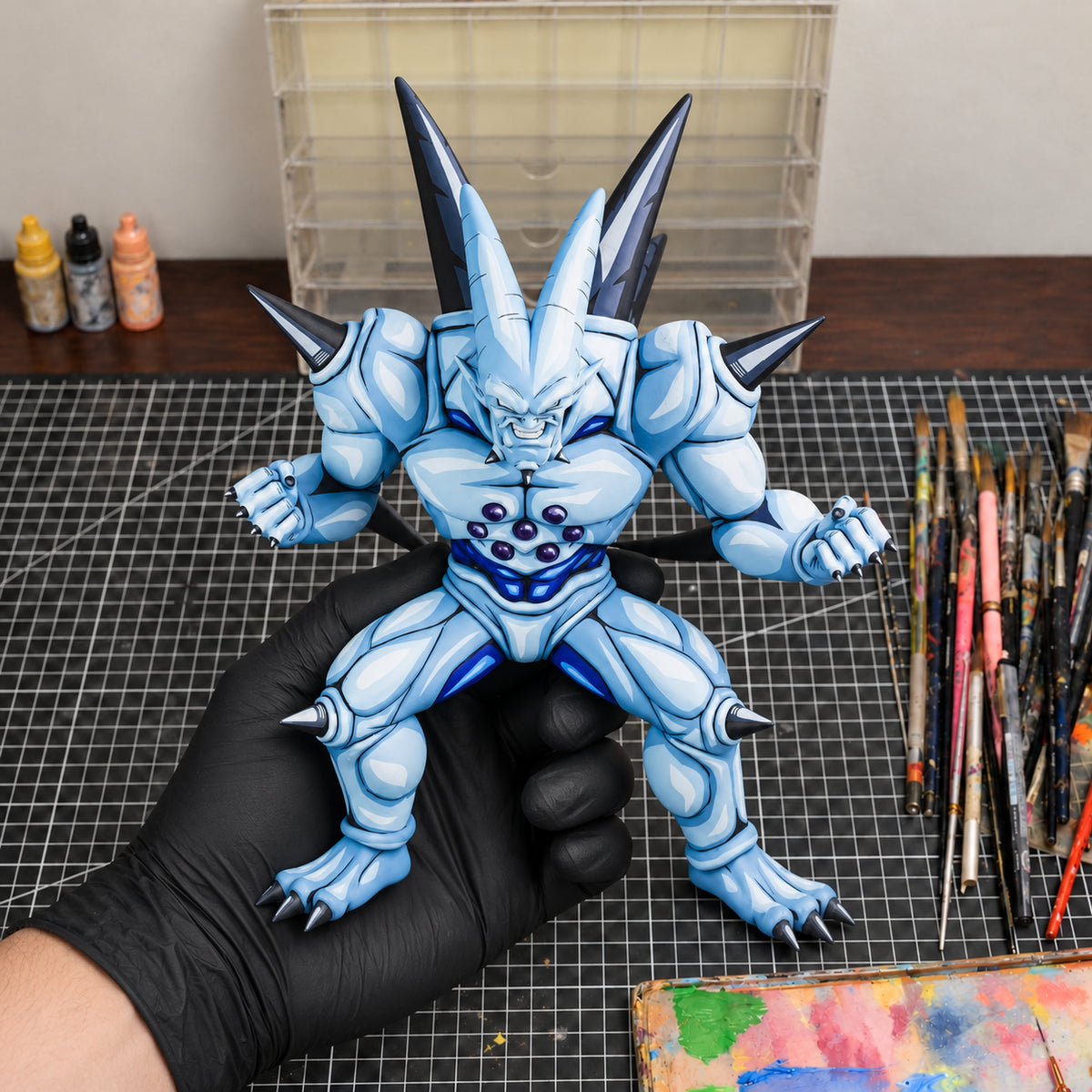 2D Colour Dragon Ball Omega Shenron Figure Repaint — held securely in one gloved hand