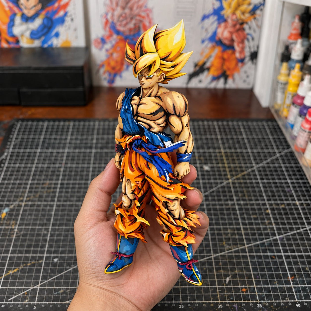 Dragon Ball Son Goku Namek Figure Repaint — hand or studio view