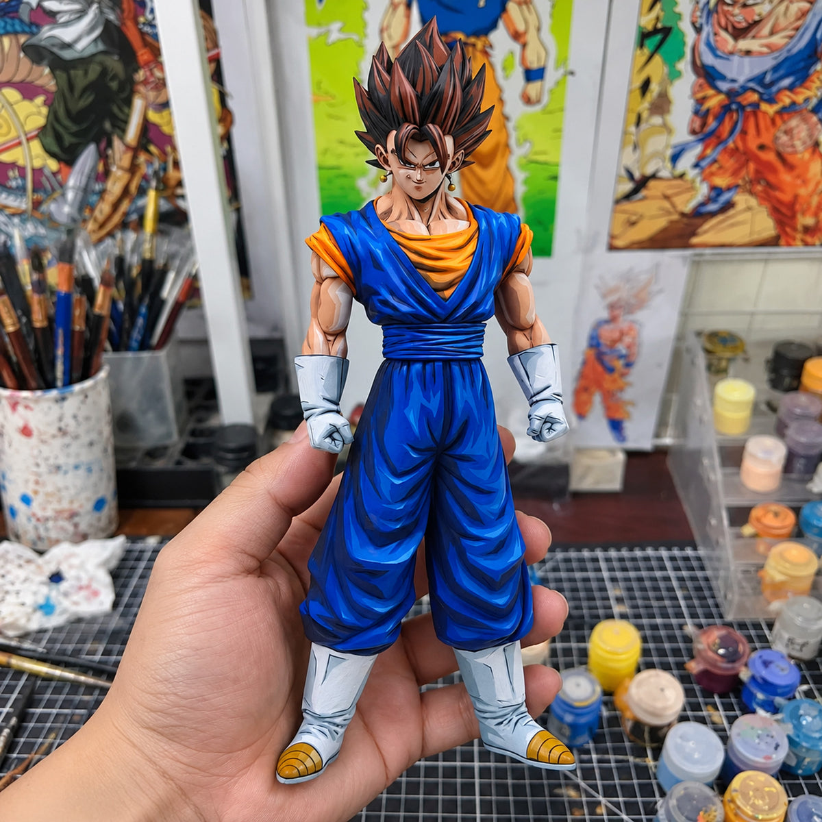 Hand-Painted Dragon Ball Vegito Base Form Figure Repaint — hand or studio view