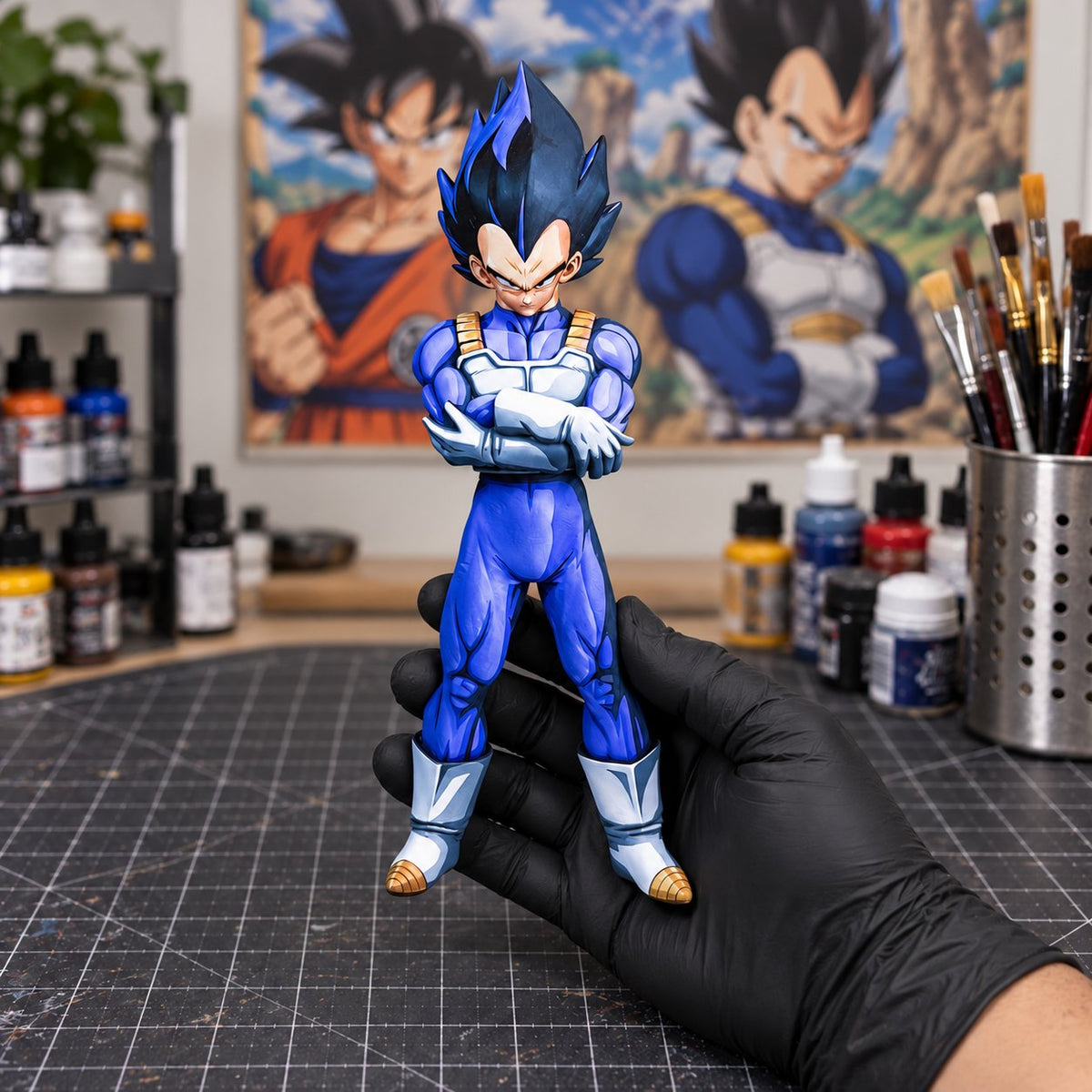 Dragon Ball Z Vegeta Figure Repaint — figure held in hand in a painting workshop