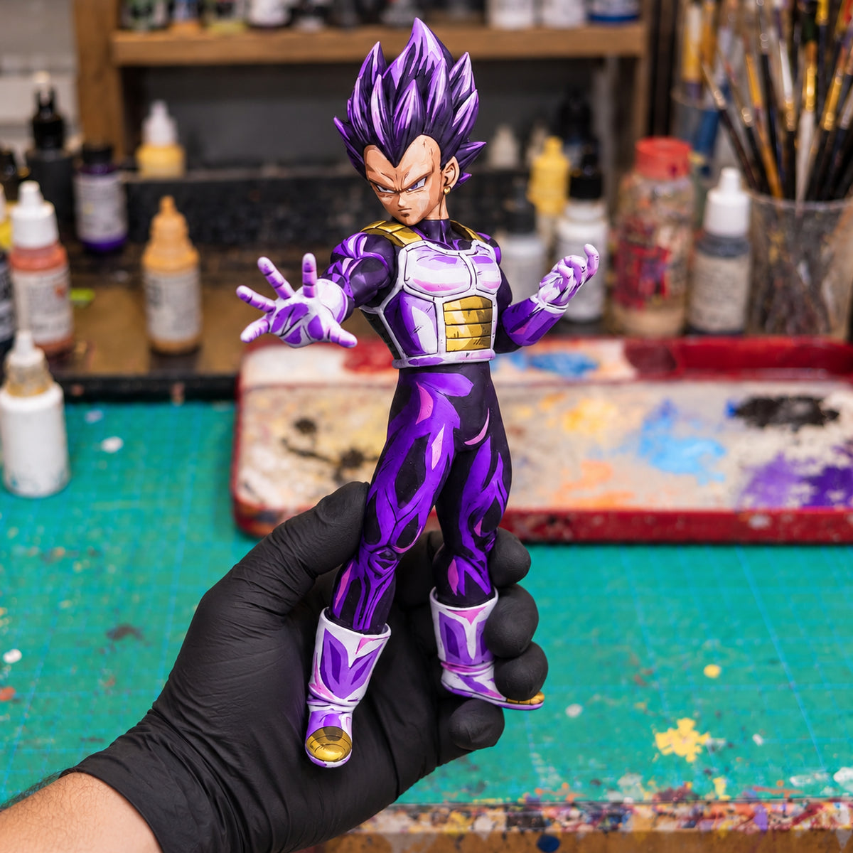 Anime Style Dragon Ball Super Vegeta Ultra Ego Figure Repaint — held securely in one gloved hand