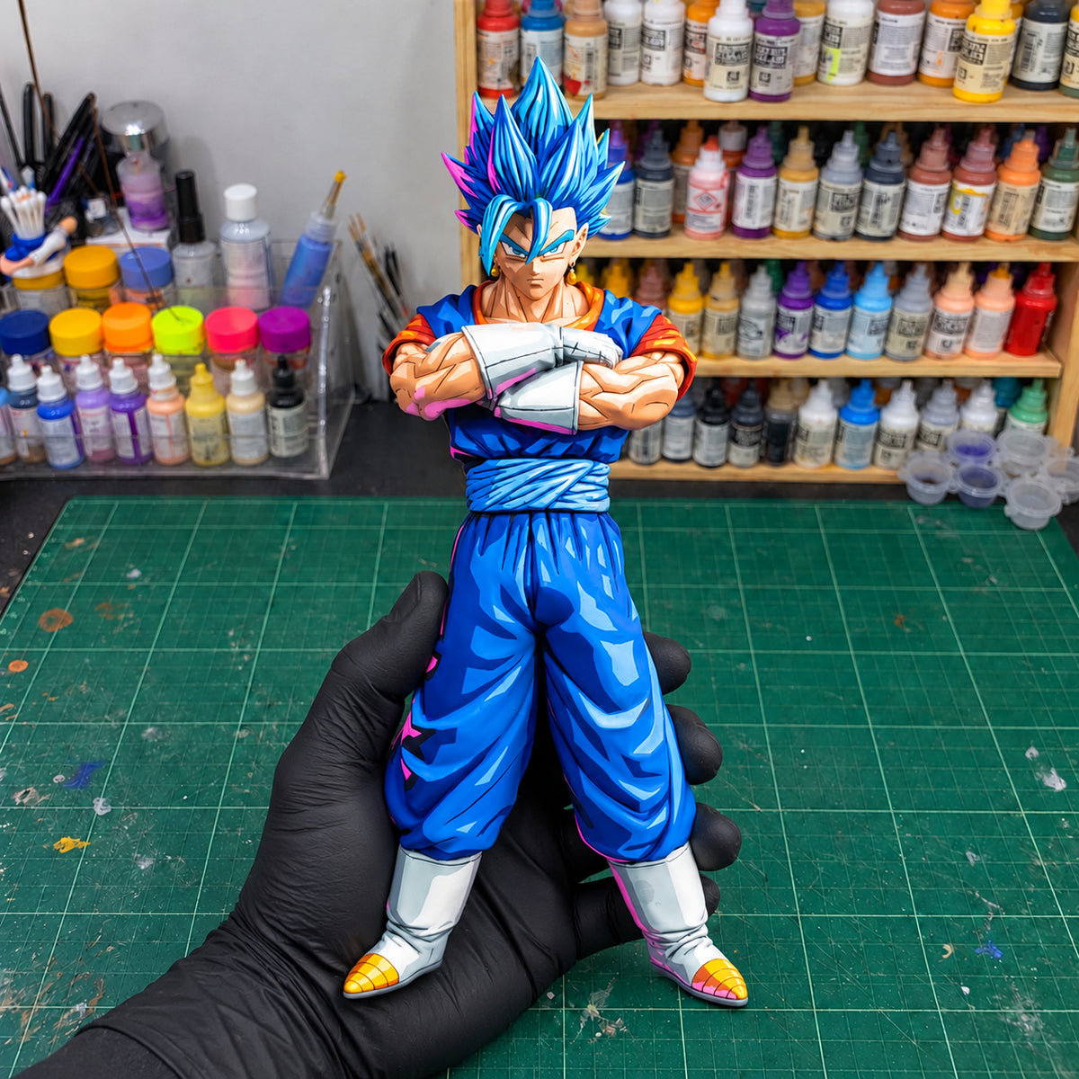 Anime Colour Dragon Ball Vegito Master Stars Figure Repaint — held securely in one gloved hand